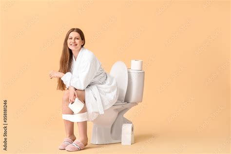 woman sitting on the toilet|Free Woman Sitting On Toilet Photos .